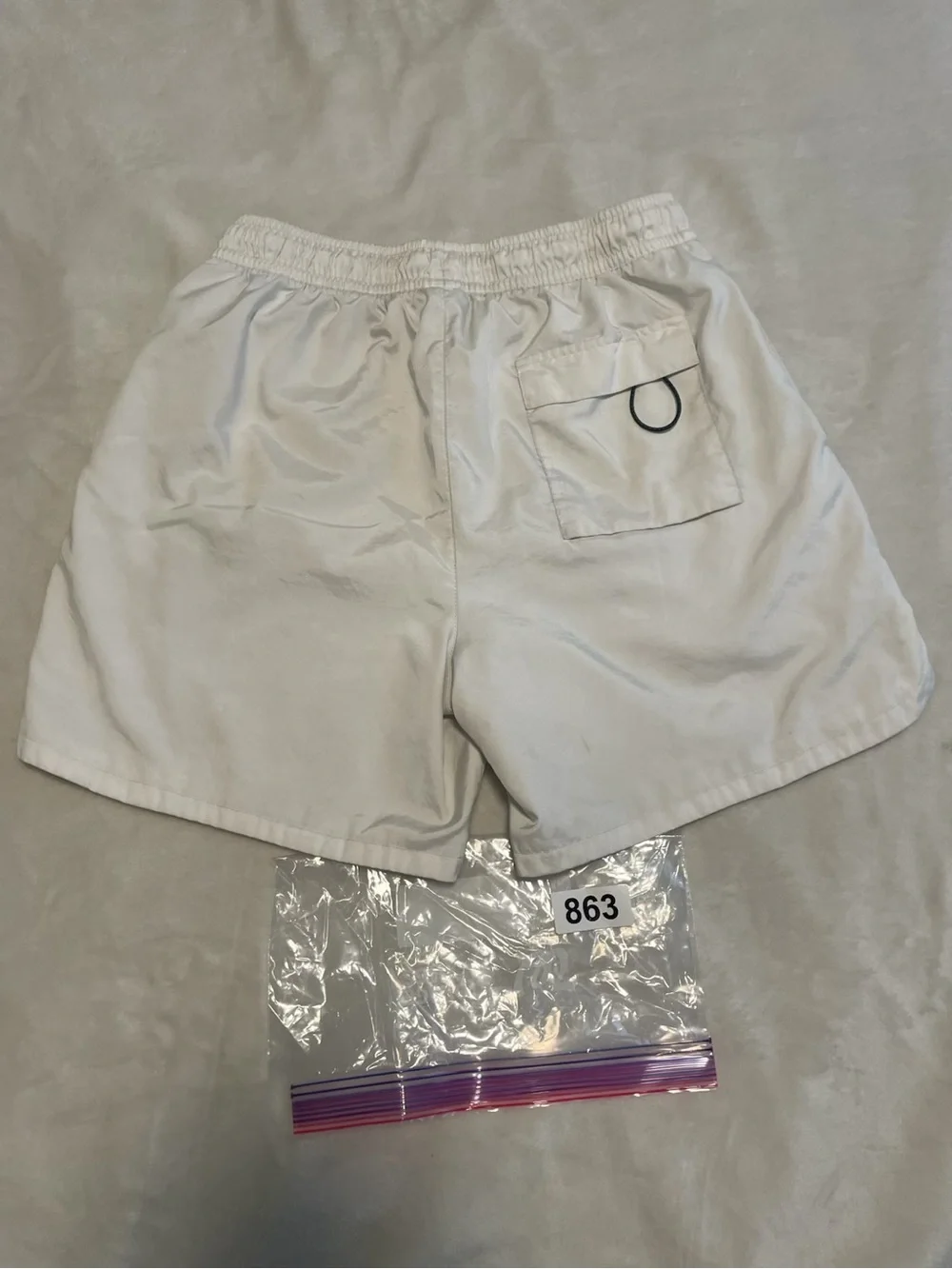Nike White Shorts with Black Outlined NIKE Lettering